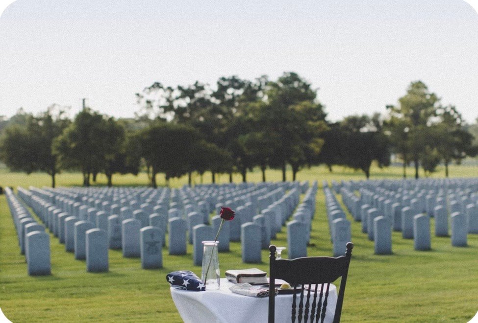 A national veterans cemetery with headstones lined up in neat rows